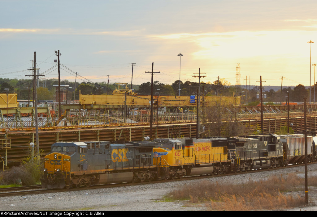 A Sunset Freight W/ 3 Railroads On Board